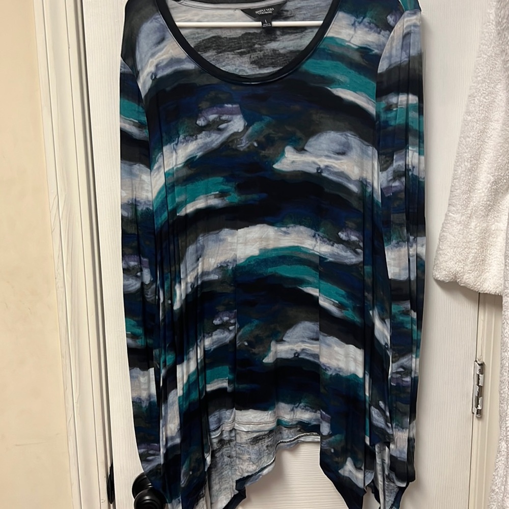 Long sleeve a-symmetrical hemline